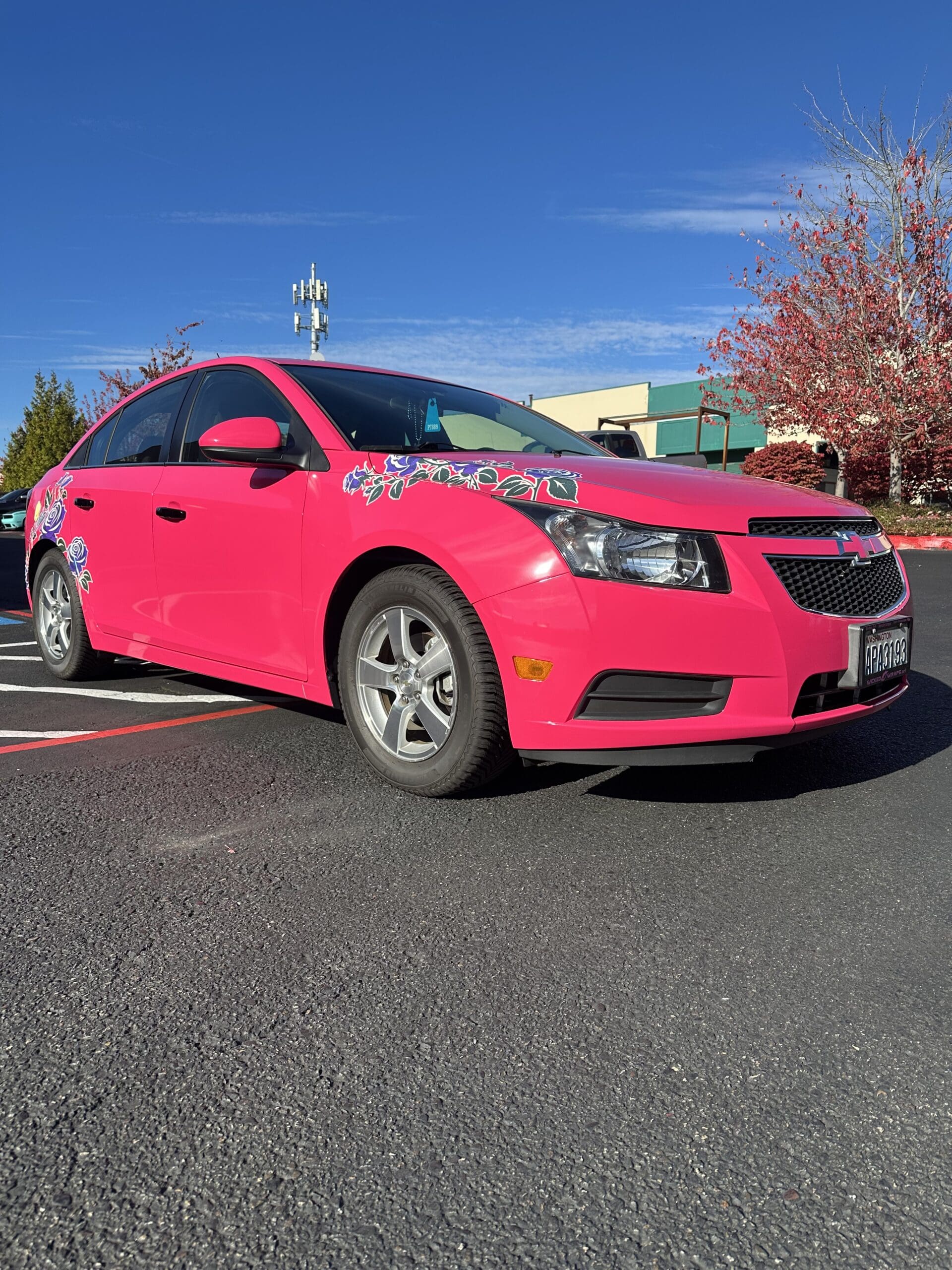Chevrolet Cruze – Hot Pink Wrap with Custom Floral Graphics
