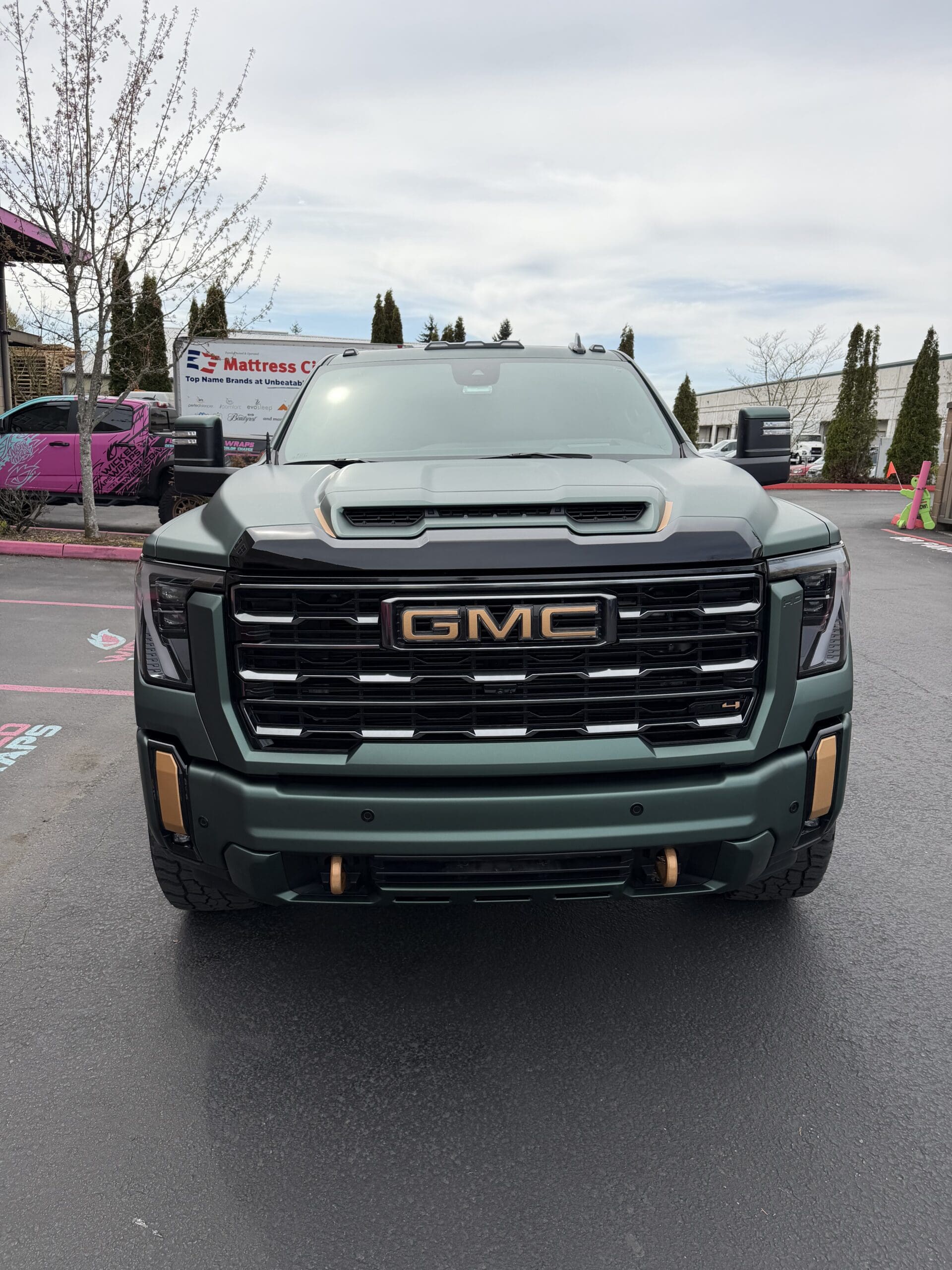 GMC Sierra 2500 HD AT4X – Satin Sage Green Wrap with Bronze Accent Package